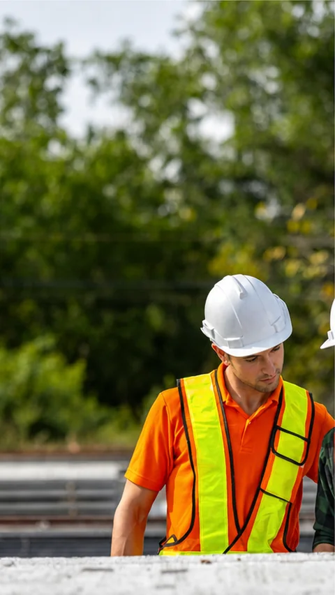 Industrial professional reviewing site requirements