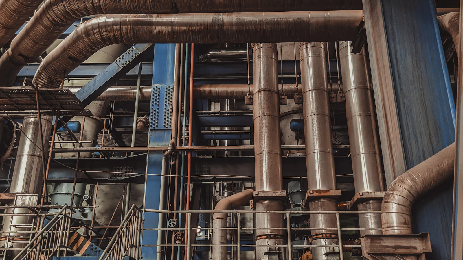 a large factory with many pipes