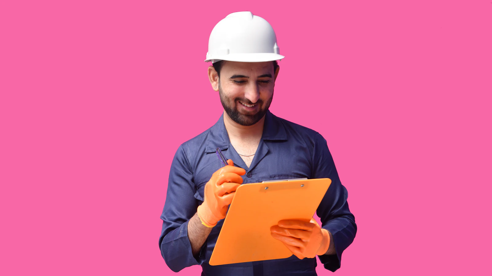a man wearing a hard hat and holding a yellow folder