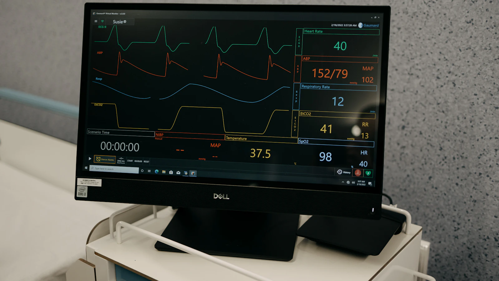 a monitor is on a stand in a room