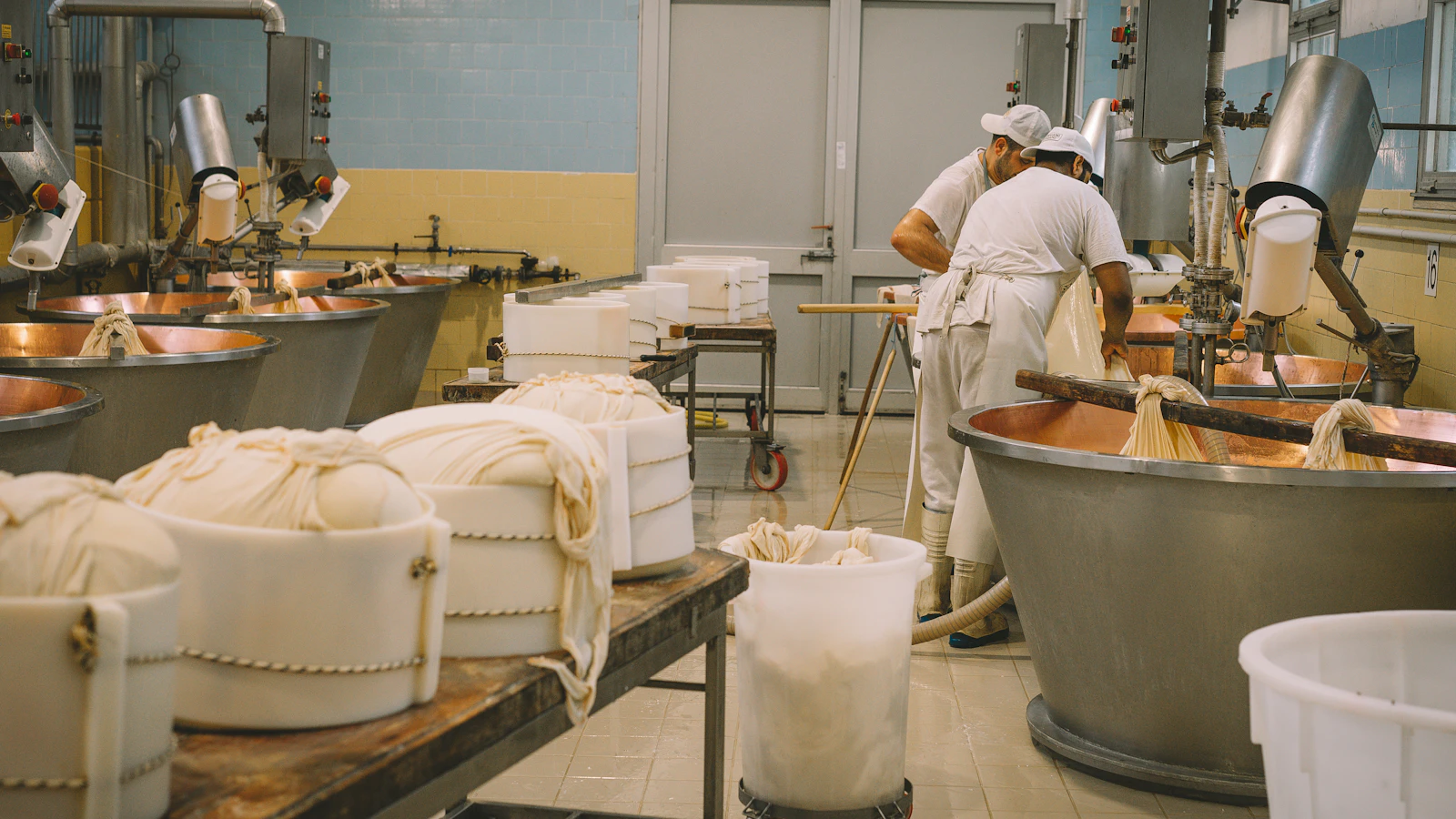 a few men working in a factory