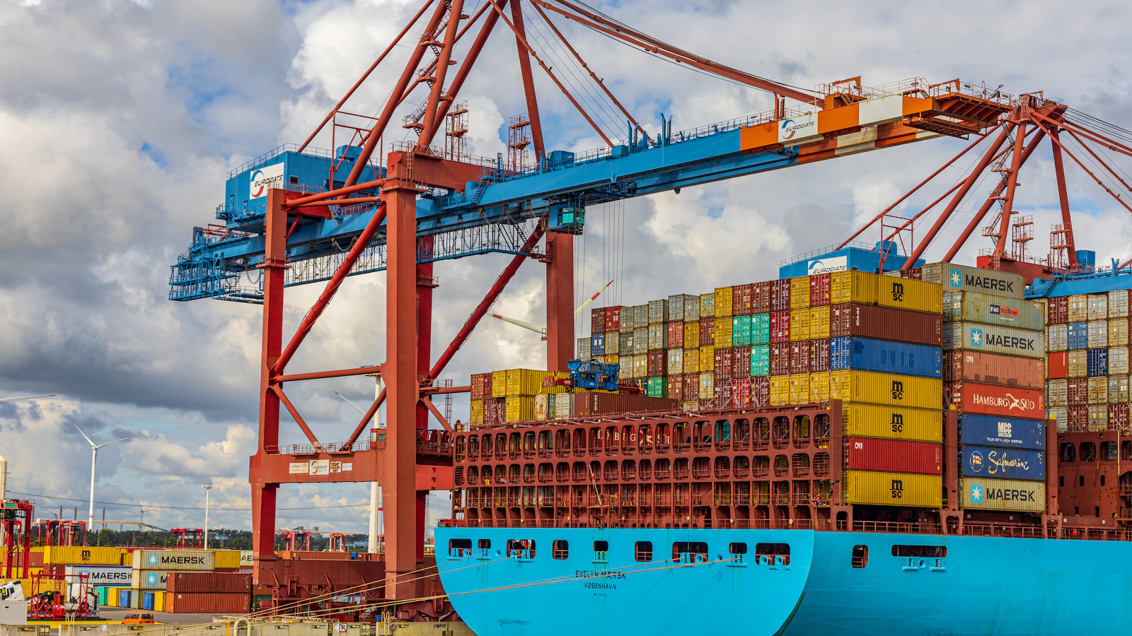 blue and red cargo ship