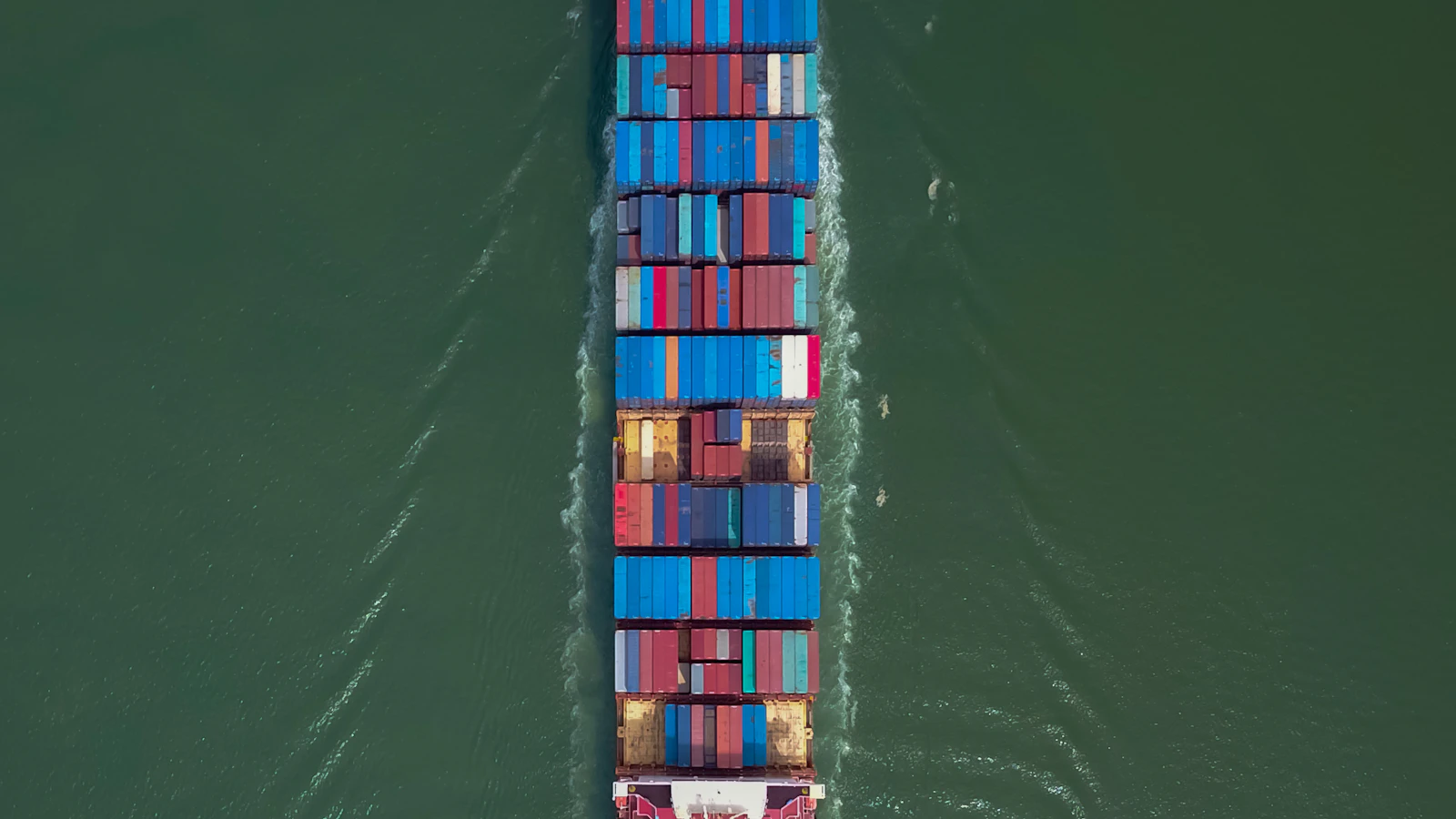 white and blue ship on sea during daytime