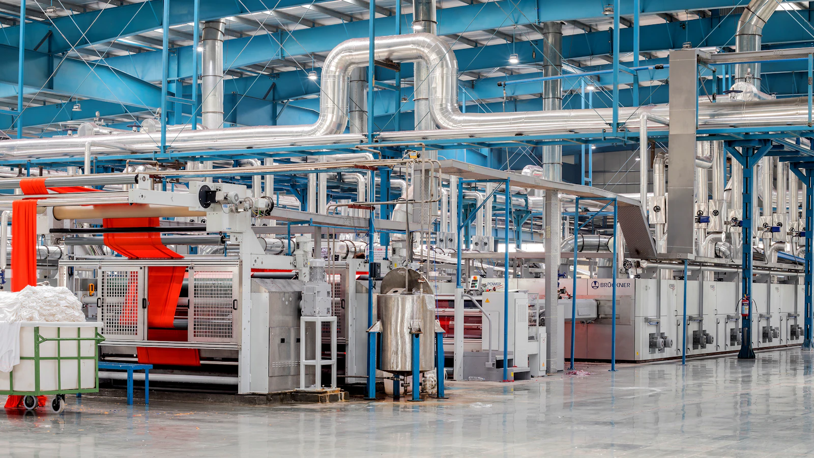 industrial textile factory with machinery and pipes