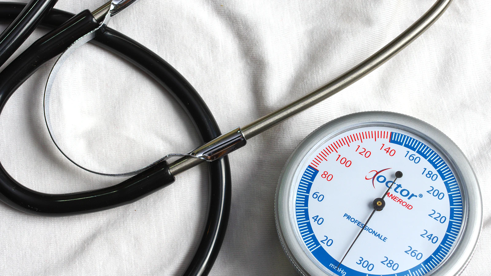 a stethoscope, a thermometer and a stethoscope