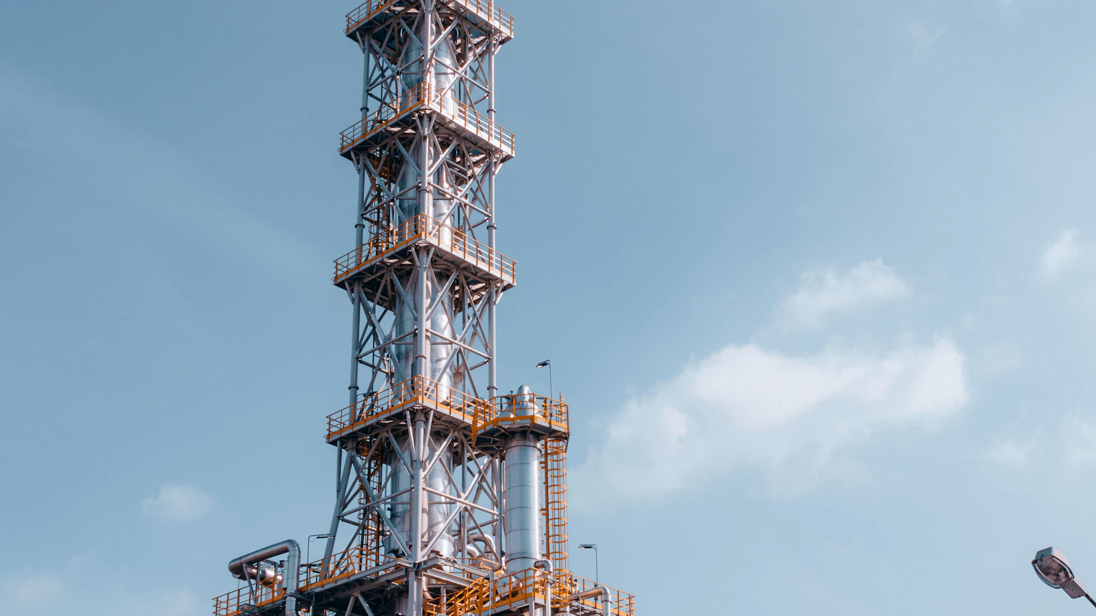 a very tall tower with a lot of pipes