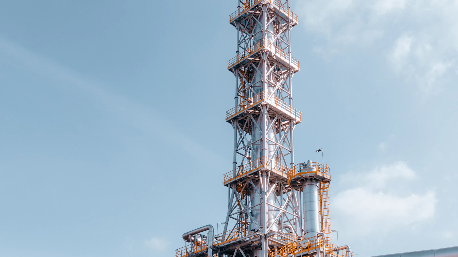 a very tall tower with a lot of pipes