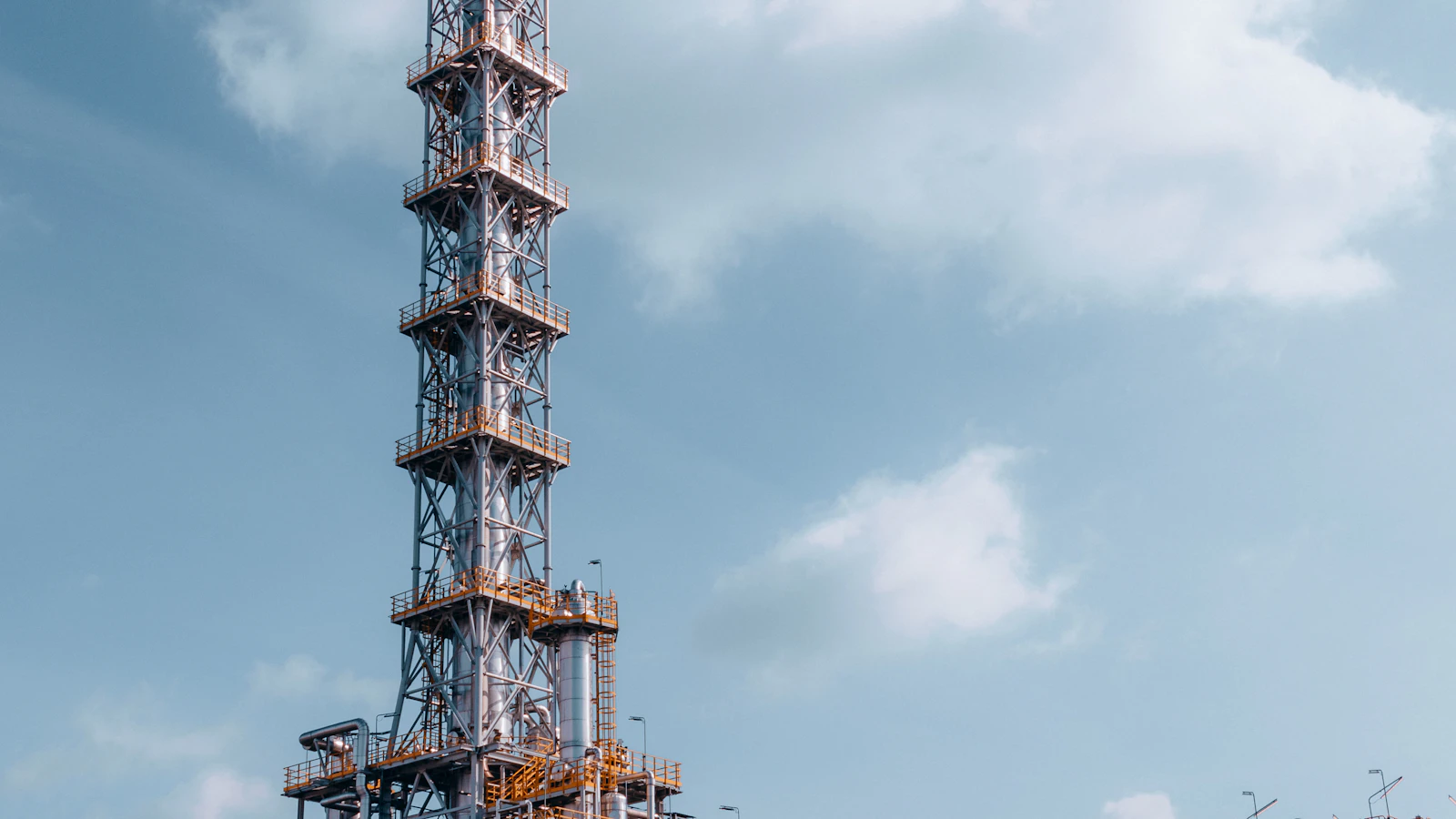a very tall tower with a lot of pipes