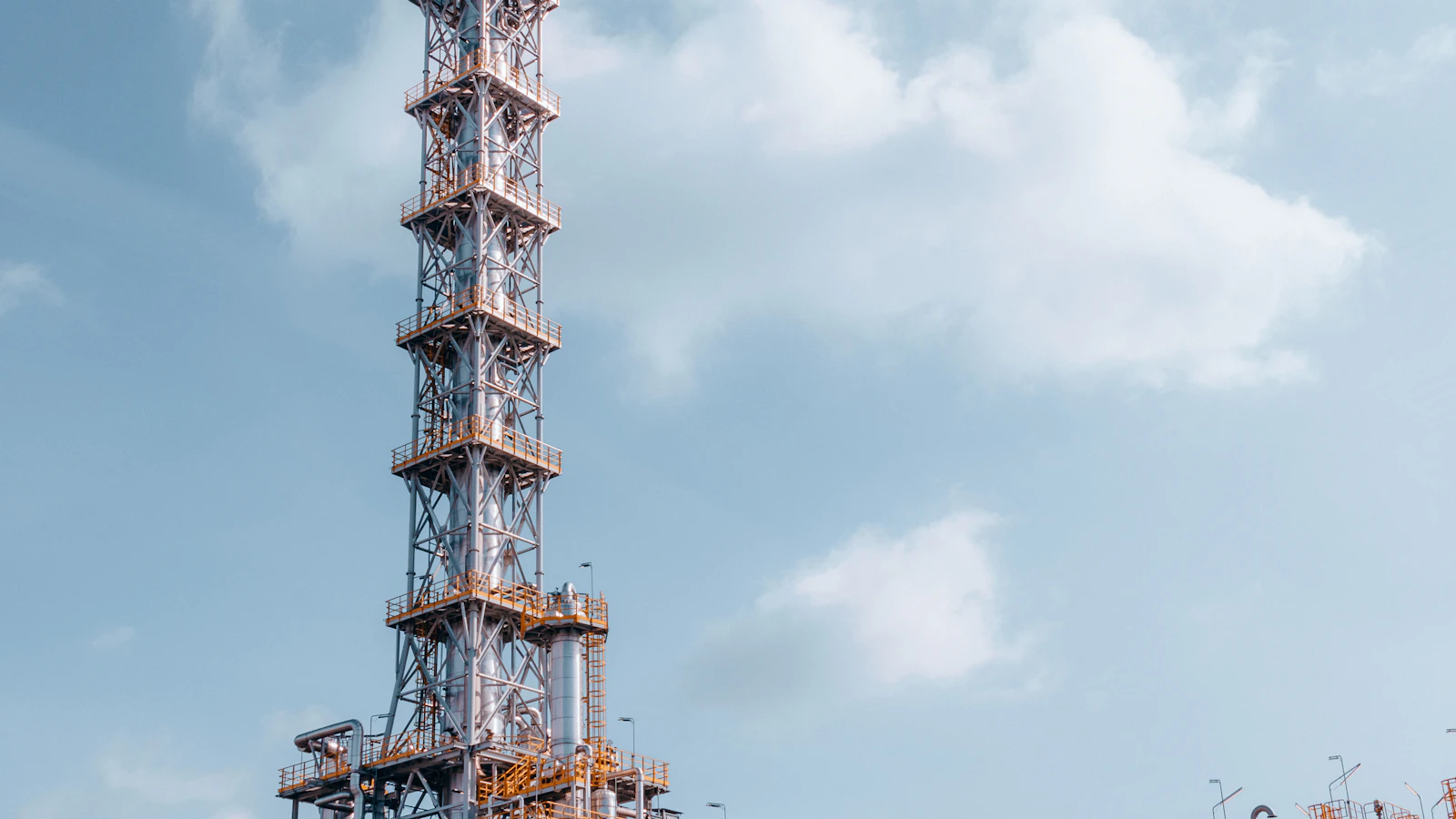 a very tall tower with a lot of pipes