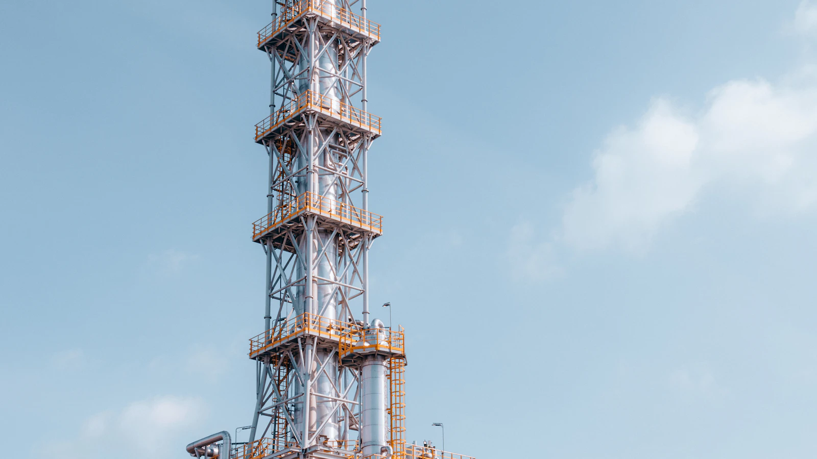 a very tall tower with a lot of pipes