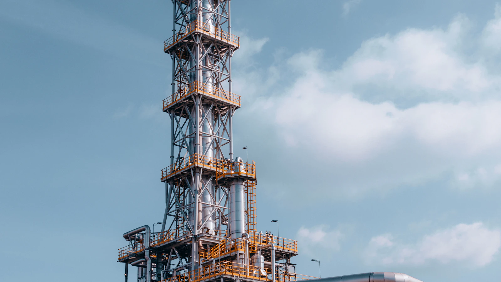 a very tall tower with a lot of pipes