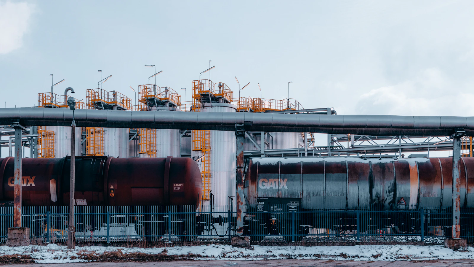 a train on a train track near a building
