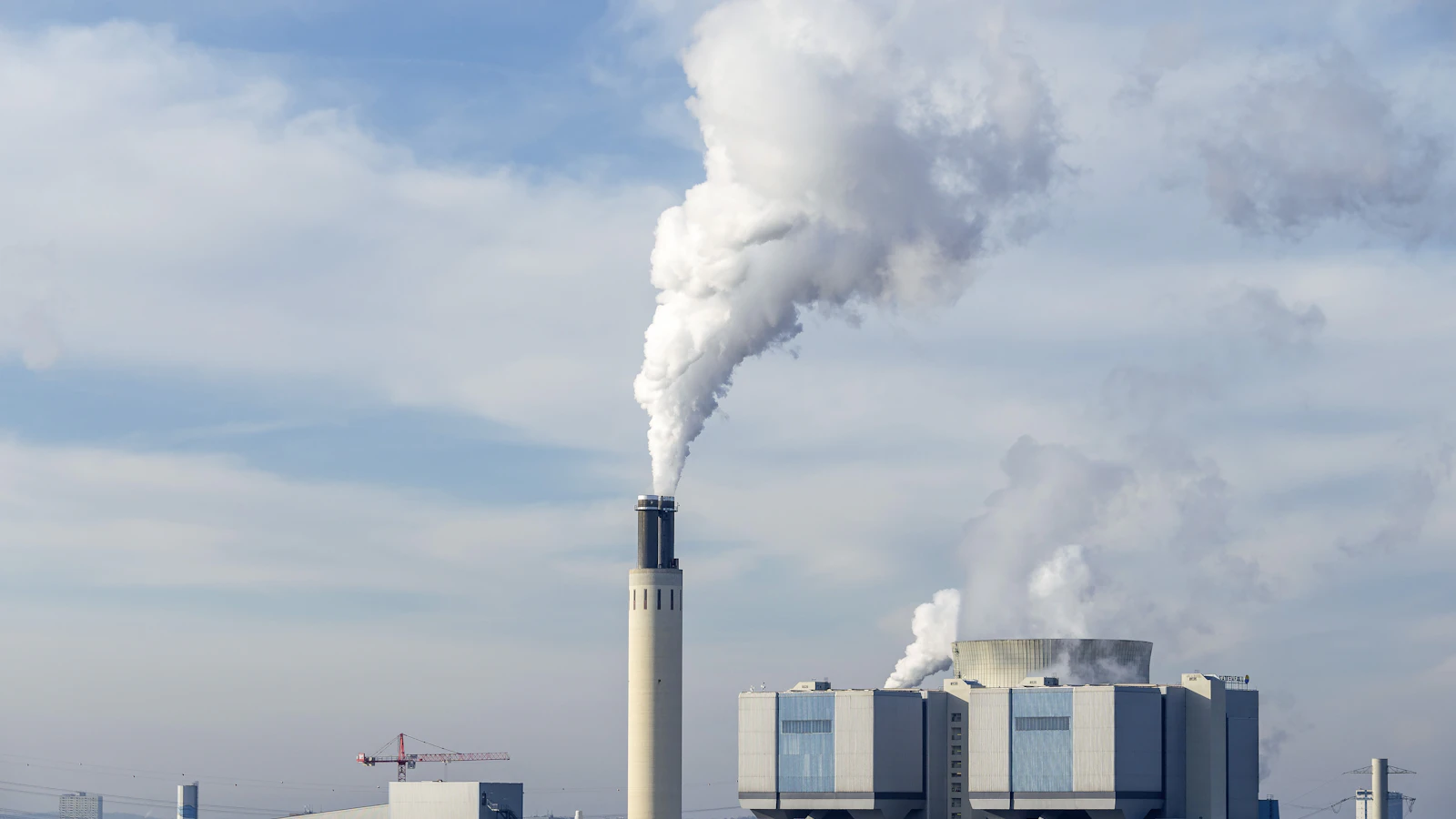 a factory with smoke coming out of it